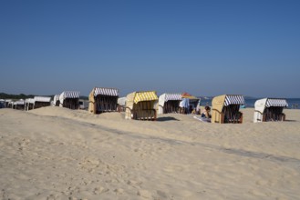 Beach chairs and tourists on the sandy beach, Swinemünde, Usedom Island, Baltic Sea, Poland, Europe