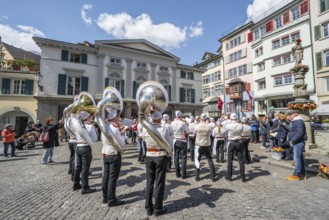 Historically costumed guildsmen in Zurich's Old Town, stand concert at Münzplatz, Zunft zum Weggen,