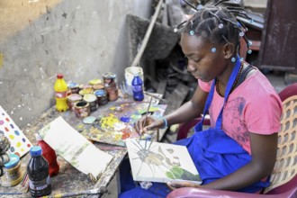 Young artist in a gallery, Brazzaville, Republic of Congo