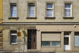 Unrenovated historic house facade in the city centre of the Upper Silesian town of Konstadt, Polish