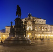 Semperoper am Theaterplatz with King Johann monument in the evening, Dresden, Saxony, Germany,