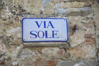 Street sign on a wall in Aliano, the very poor village in southern Italy that the writer Carlo Levi