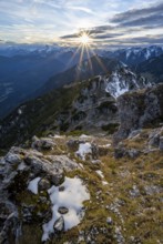 Mountain panorama, mountain landscape with sun star at sunset, at the summit of the Kramerspitz, in