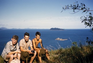 Melbourne Grammar School expedition to Queensland, Australia, 1956 three boys sit on the shore