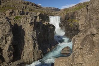 Fossardalur Waterfall close to Djupivogur at the Berufjord, Easter Iceland