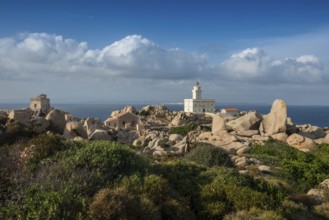 Lighthouse and huge granite rocks by the sea, Capo Testa, near Santa Teresa di Gallura, Sardinia,