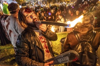 The Zombiewalk in Essen, on Halloween several hundred people, some dressed as scary zombies,