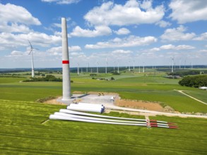 Wind farm near Brilon-Radlinghausen, new wind turbine being built, tower elements and rotors ready