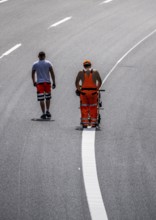 Marking work after the renewal of the road surface on the A40 motorway between the Kaiserberg