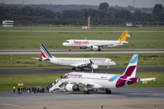 Düsseldorf Airport, Pegasus Airline, Airbus A321neo on take-off, Airfrance Hop, Embraer ERJ-190 on