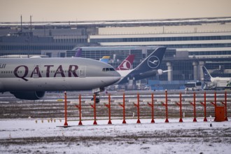 Aircraft on the taxiway at Frankfurt FRA airport, Fraport, in winter, Hesse, Germany, Europe