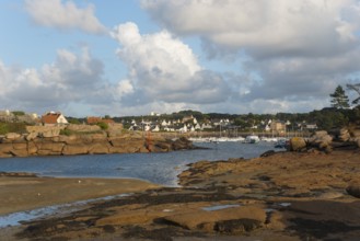 View of a coastal village with rocks and clouds in the sky, Trégastel, Tregastel, Ploumanac'h,