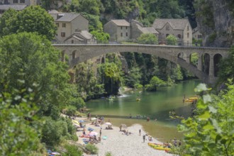 View of the village of Saint Chely with bridge and waterfall, Gorges du Tarn Causses, Département