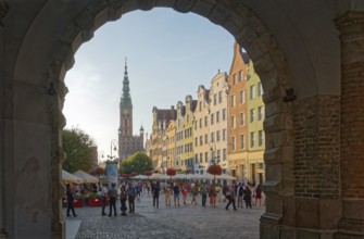 View through an archway, Green Tor, to the city centre of Gdansk. Gdansk, Pomerania, Poland, Europe