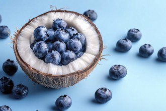 Fresh blueberry fruits in coconut shell on blue studio background. Generative AI, AI generated