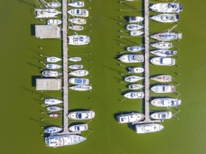 Aerial view, drone photo: Yachts on the jetty in Krummin natural harbour, Krumminer Wiek on the