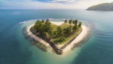 Symbol, small heart-shaped island in the sea, love island, honeymoon, palm beach, aerial view,