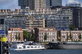 Harbour basin of the Maashaven, inland waterway port, jetties, residential buildings in the Kop van