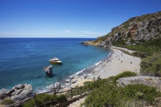 Excursion boat at Preveli Beach at the end of the Kourtaliatiko Gorge, south coast, Crete, Greece,