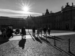 Black and white photograph, people against the light, Bebelplatz, Berlin, Germany, Europe