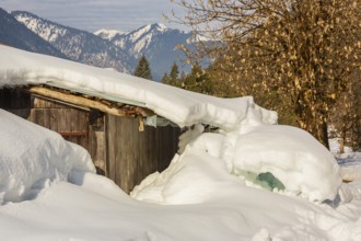 Snow covered barn at the Garberl Alpe in the Eng valley