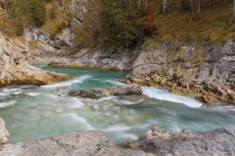 The Riss creek flowing through an autumnal landscape in the Eng valley