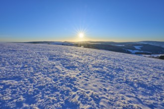 Sunny winter landscape with a wide view and blue sky, Winter, Wasserkuppe, Gersfeld, Rhön, Hesse,