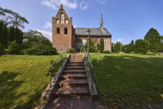 St Martin's Church, Evangelical Lutheran parish of Zetel, brick staircase, metal railings, lawn,