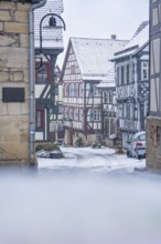 Snowy view of a narrow alley with half-timbered houses, Sindelfingen, Germany, Europe