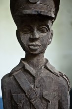 Old wooden statuette representing a colonial officer Gambia