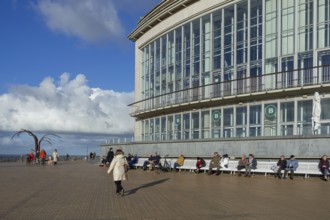 Casino-Kursaal and sculpture Dansende Golven, Dancing Waves on promenade in winter at seaside