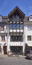 Bells on a house on Marktstraße in Bad Münstereifel, Eifel, Euskirchen district, North