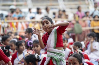 A girl plays Gagana (musical instrument) as she participate in a Bihu dance workshop, ahead of