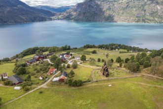 Aerial view of Urnes stave church, Lustrafjord, inner branch of the Sognefjord, Norway, Europe