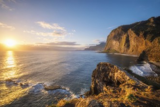 View of Madeira scenic cliffs coastline landscape on sunrise, Guindaste viewpoint, Madeira island,