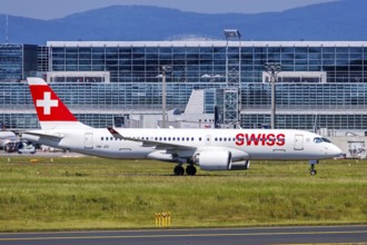 A Swiss Airbus A220-300 aircraft with the registration HB-JCI at the airport in Frankfurt, Germany,