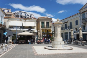 Lively square with a central fountain, surrounded by cafés and historic buildings, Old Fountain,