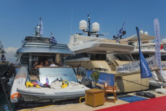 Luxury yachts side by side in the harbour in sunny weather, Mediterranean Yacht Show, harbour,