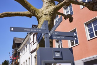 Signpost to the Orchheimer Tor, castle, Werther Tor, town hall and collegiate church in Bad