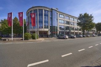 Head office of Niederrheinische Sparkasse RheinLippe with flags on Bismarckstraße in Wesel, Lower