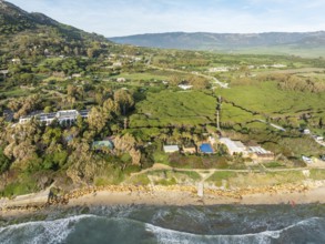 Atlantic Ocean coastline, Hurricane Hotel and the hinterland near Tarifa. Aerial view. Drone shot.