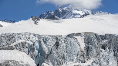 High alpine mountain landscape, Glacier du Tour, glacier with crevasses and mountain peak, summit