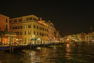 Night shot of the Rialto Bridge from the vaporetto, Venice, Metropolitan City of Venice, Italy,