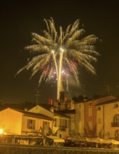 Fireworks from the Scaliger castle in the foreground Houses of, Borghetto, Valeggio sul Mincio,