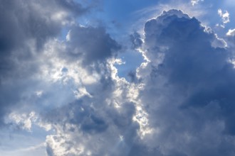 Rain clouds, blue sky