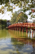 Huc Bridge (red bridge), entrance to Ngoc Son Temple on Hoan Kiem Lake, Hanoi, Vietnam, Asia