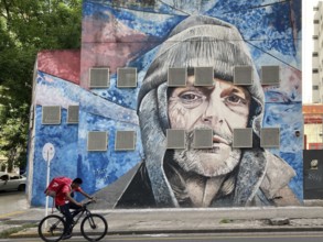 Street art with a cyclist from the delivery service Pedidos Ya, Buenos Aires, Argentina, South