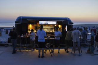 Sale of drinks and food to tourists on the beach on the island of Borkum, 19.07.2024