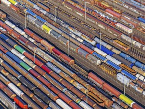 Deutsche Bahn AG marshalling yard. Many goods trains are parked on the tracks with tank wagons, car