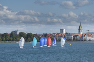 Cityscape, dinghies with spinnaker, church tower, St. Nicholas Church, Friedrichshafen on Lake